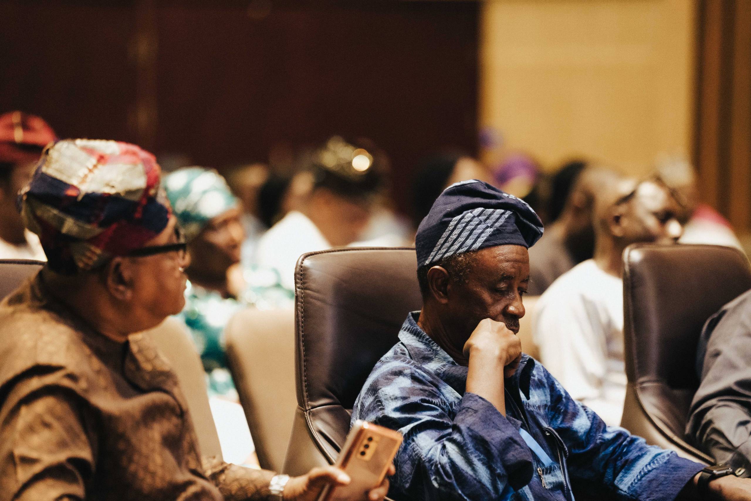 Members of the audience at Glover Memorial Hall, seated in the auditorium.